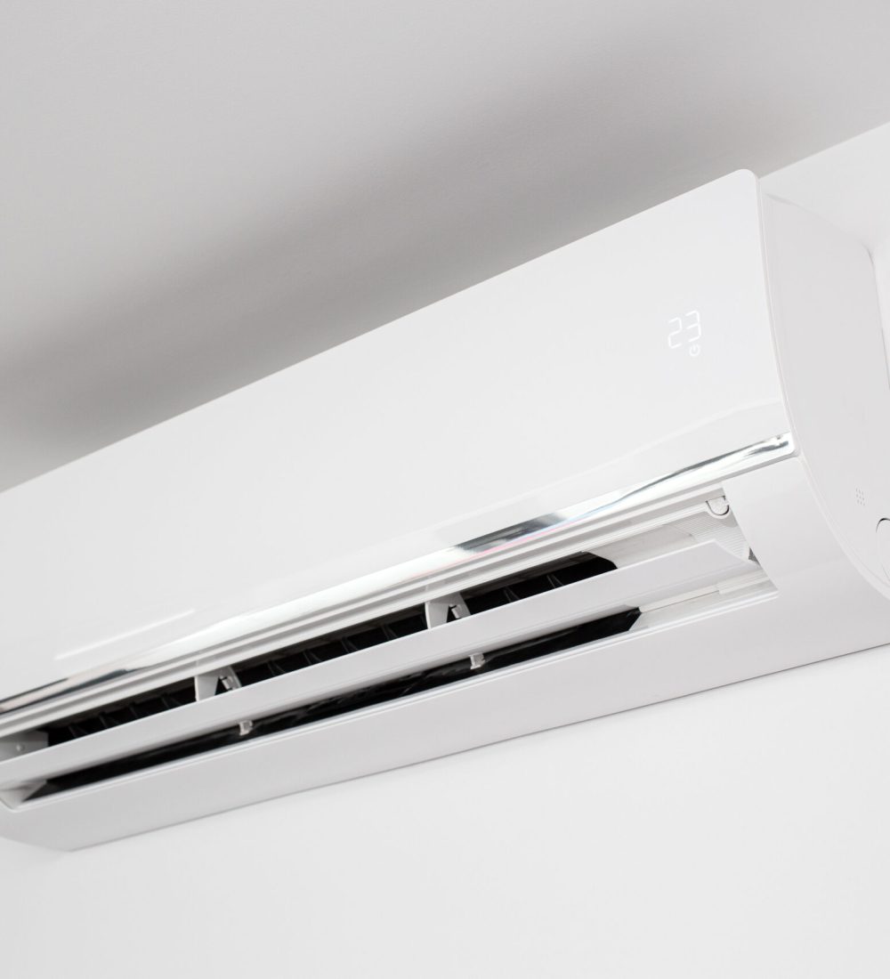 Domestic Indoor Air conditioner unit mounted on wall used for heating or cooling a space. Working at 23 degree celsius
